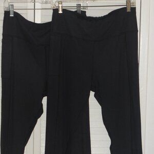 (2) Pairs of Land's End high waisted swim leggings Size Mediums
